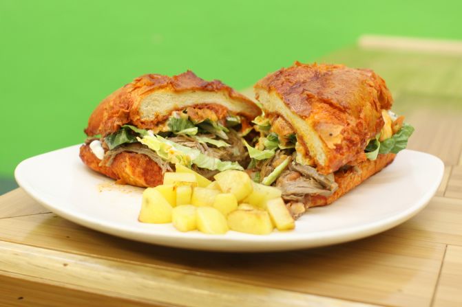 With fillings such as chorizo, carne asada or chicken, the Mexican pambazo has many similarities to the torta. What makes the pambazo different is that the sandwich is dipped in red guajillo pepper sauce, adding heat -- and a level of eating difficulty. Pictured: pambazo from Siete Luminarias in St. Louis
