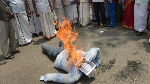 Indian fishermen burn an effigy of Prime Minister Manmohan Singh in Trivandrum, Kerala, on March 13, 2013.
