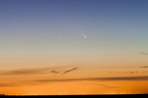 Science journalist Philip Downey snapped this photo of Comet Pan-STARRS in Port Dalhousie, Ontario, looking west over Lake Ontario on March 14. "A cold wind off the lake doesn't begin to describe the conditions," he says. "But it was definitely our best chance to see it, so we took it."