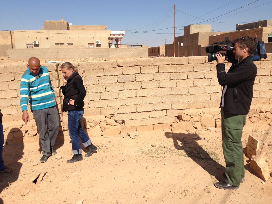 Mohammed Rejeb shows Damon the graves in Husayba where members of his family are buried.