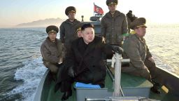 EDITORS NOTE--- RESTRICTED TO EDITORIAL USE - MANDATORY CREDIT 'AFP PHOTO / KCNA VIA KNS' - NO MARKETING NO ADVERTISING CAMPAIGNS - DISTRIBUTED AS A SERVICE TO CLIENTS This undated picture taken by North Korea's official Korean Central News Agency on March 11, 2013 shows North Korean leader Kim Jong Un (C) visiting the Wolnae Islet Defence Detachment in North Korea's western sector near the disputed maritime frontier with South Korea . AFP PHOTO / KCNA via KNS (Photo credit should read KNS/AFP/Getty Images) 