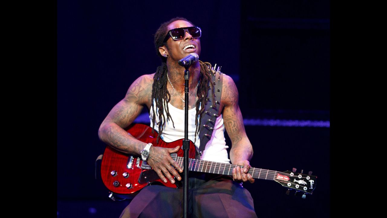 Rapper Lil Wayne performs onstage during his "I Am Music" Tour at the Gibson Amphitheater on March 29, 2009, in Universal City, California.