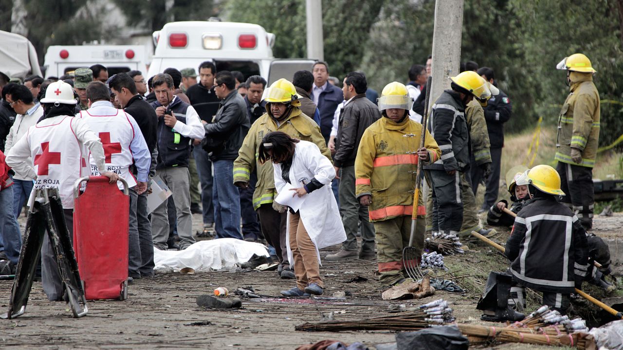 Rescue workers at  the scene of a fireworks explosion in Jesusito Nativitas, Tlaxcala, Mexico, March 15, 2013. 