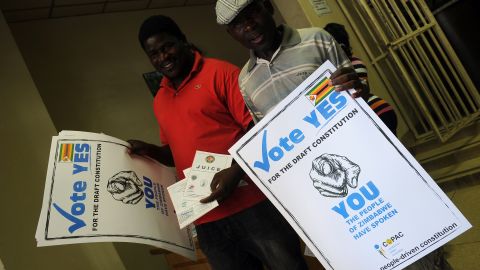 Posters call on Zimbabweans to say yes during the March 16 vote on the constitutional referendum.