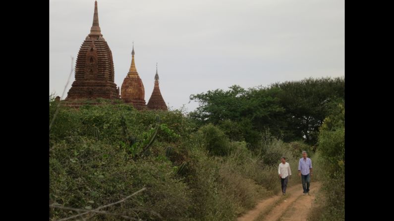 Bourdain and Les Halles owner Philip Lajaunie walk around Old Bagan.