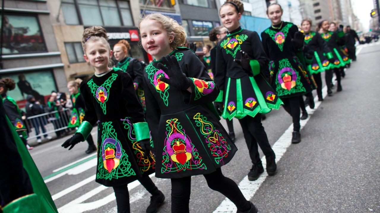 Young girls don Irish-inspired dresses as they participate in New York City's annual St. Patrick's Day Parade on March 16.