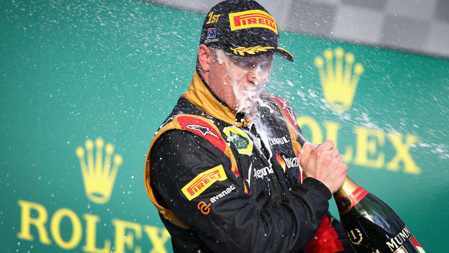 Kimi Raikkonen of Finland and Lotus celebrates after winning the Australian Formula One Grand Prix, Melbourne. March 17, 2013.