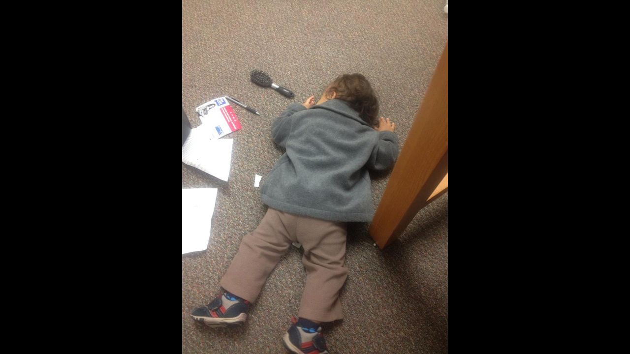 For the most part, I try to focus on school during my son's nap times. Here, due to a child care snafu, Emeka takes a nap in the library. On the floor. 