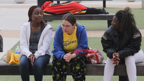 Evacuated students at the University of Central Florida on Monday wait to return to their dorm rooms.