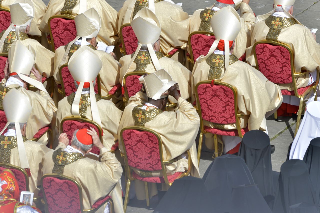 Cardinals attend the ceremony in which Latin America's first pontiff received the formal symbols of papal power.