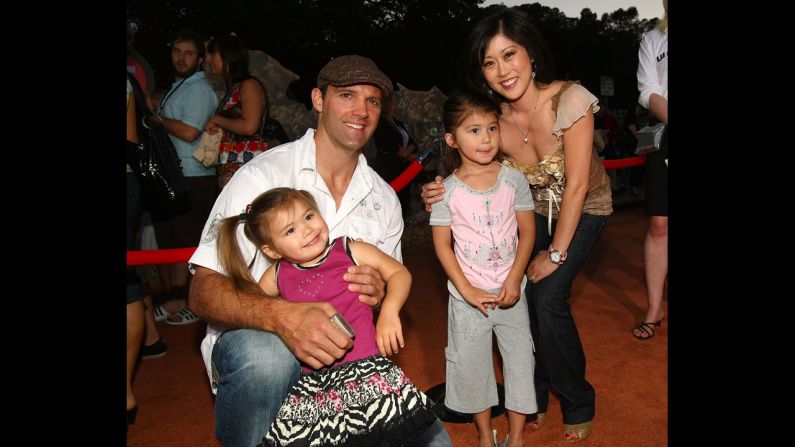 Olympic gold medalist Kristi Yamaguchi met hockey player Bret Hedican at the 1992 Winter Olympics. When they were dating, the <a >figure skater said</a> they would only see Hedican for a couple hours a month because of their busy schedules. They got married in 2000 and now have two daughters. Pictured, the family arrives at a movie premiere in Los Angeles, 2008.