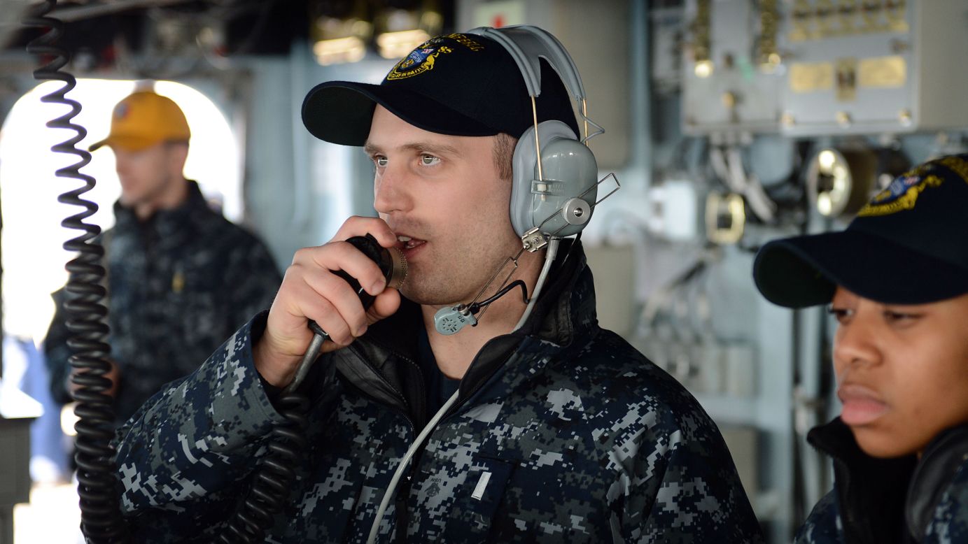 In this Navy handout image taken on March 5, Lt. j.g. Matthew Harmon serves as helm safety officer aboard the guided-missile destroyer USS McCampbell during a replenishment at sea, part of Foal Eagle 2013, the joint exercises between the United States and South Korea.