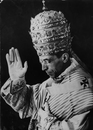 Pictured here in December 1939, Pope Pius XII, wearing the triregnum, bestows a blessing during a visit to the king and queen of Italy. The triregnum is the three-tiered papal tiara, or triple crown, that was placed on the head of the pope during the "coronation" part of the inaugural mass, Beck said. "It was last worn by Pope Paul VI, who seemed to think better of it because during the Second Vatican Council, he dramatically put it on the altar at St. Peter's Basilica and said to sell it and give the money to the poor," Beck said. No pope has had a coronation or worn the triregnum since.