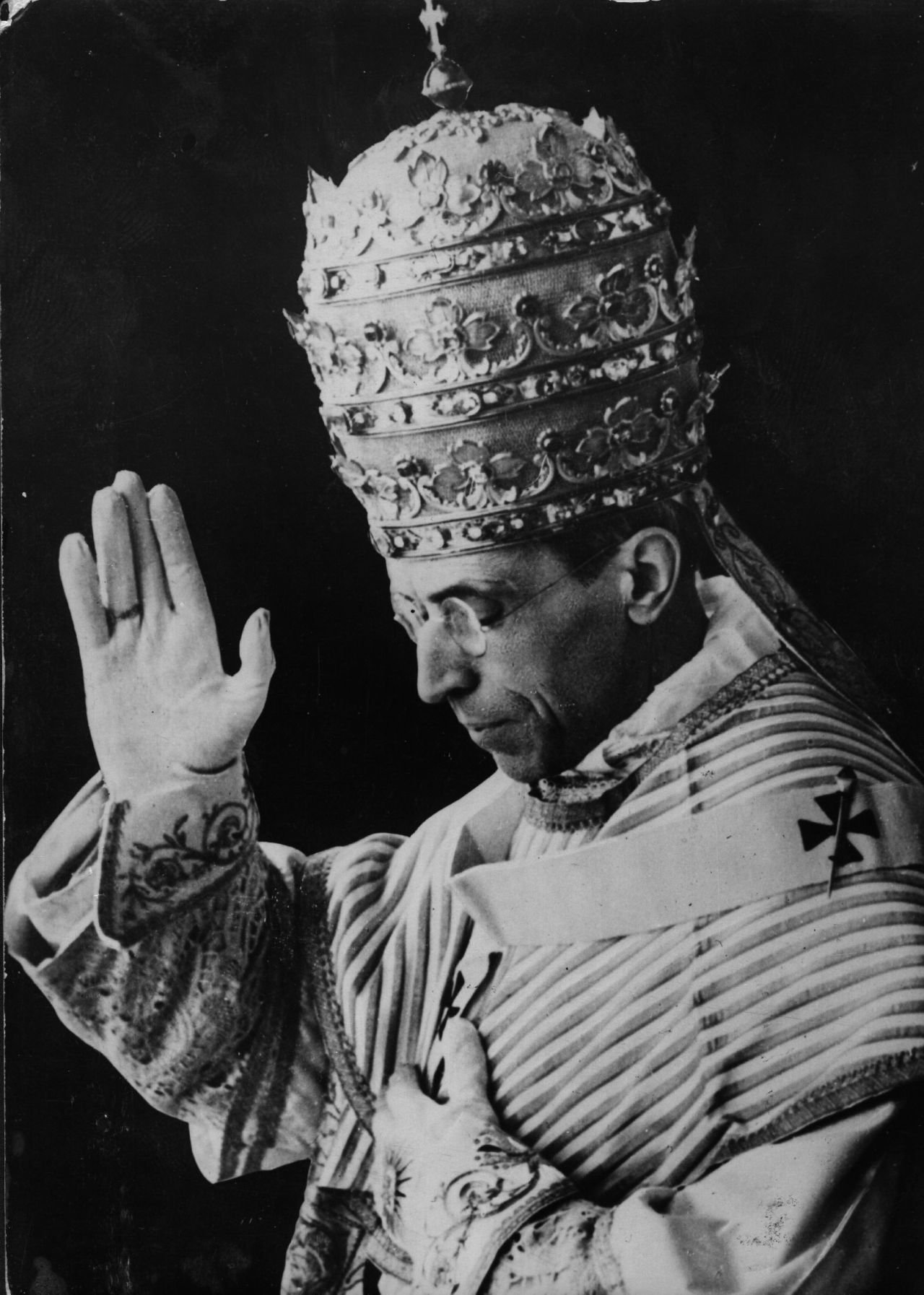 Pictured here in December 1939, Pope Pius XII, wearing the triregnum, bestows a blessing during a visit to the king and queen of Italy. The triregnum is the three-tiered papal tiara, or triple crown, that was placed on the head of the pope during the "coronation" part of the inaugural mass, Beck said. "It was last worn by Pope Paul VI, who seemed to think better of it because during the Second Vatican Council, he dramatically put it on the altar at St. Peter's Basilica and said to sell it and give the money to the poor," Beck said.  No pope has had a coronation or worn the triregnum since.