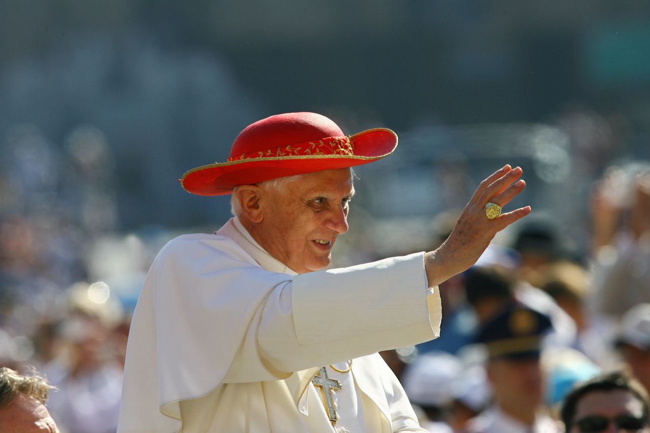 Pope Benedict XVI, seen here wearing a saturno, blesses the faithful in St. Peter's Square at the Vatican, in 2006. The saturno is a wide-brimmed red hat that gets its name from its resemblance to the planet Saturn and its rings, Beck said. "It has been used as the summer alternative to the winter camauro, " he said, but unlike the winter hat, it's not not unique to the pope.