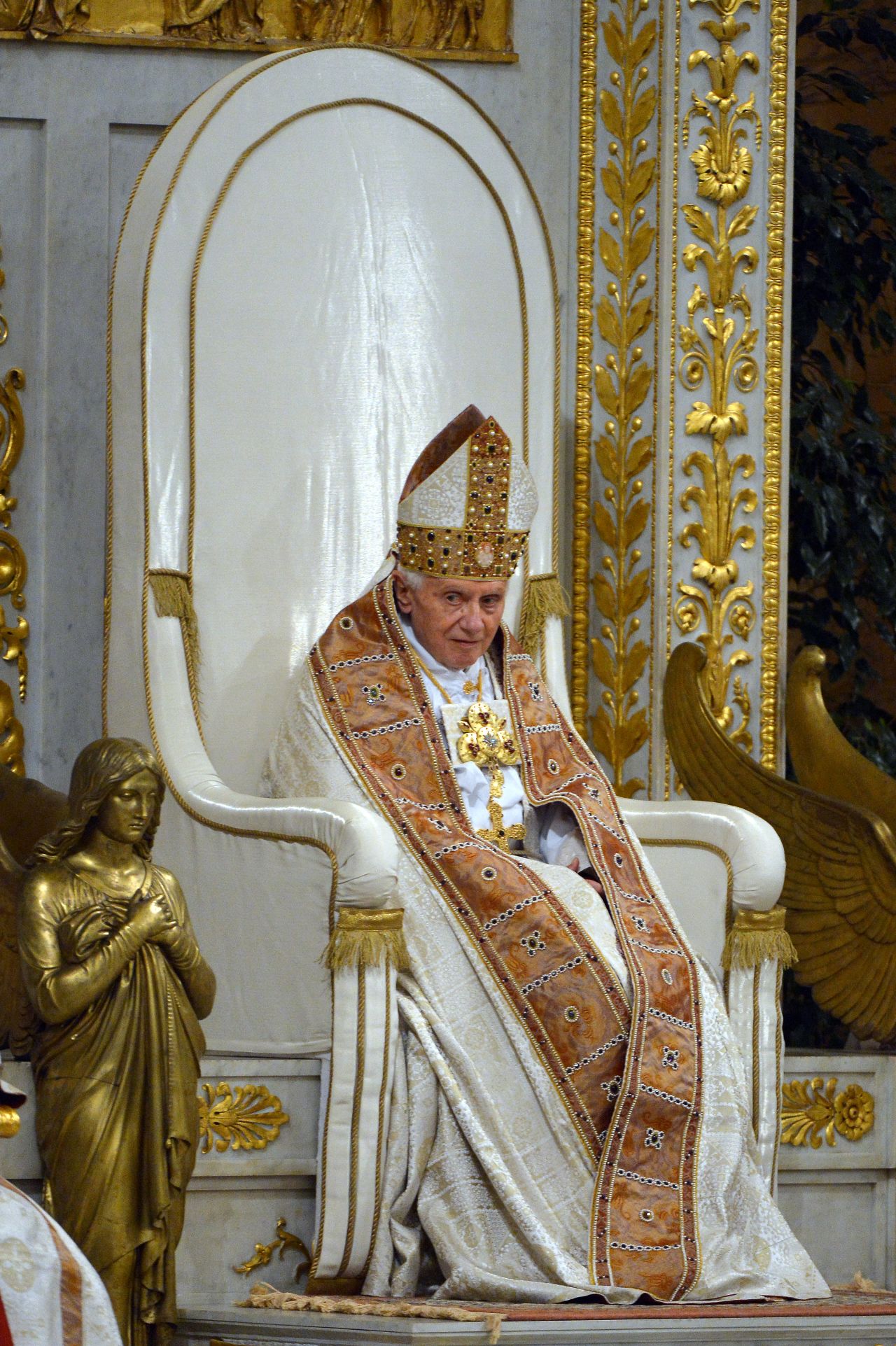 The mantum is a long cape that popes sometimes wear as a sign of their authority, Beck said. It's a vestment that fell out of use, but was revived by Benedict XVI, seen here. The mitre, Beck said, is a cone-like head dress worn by all bishops as a sign of their episcopacy. "Abbots can also wear it," Beck said. "It is not unique to the pope, but it replaced the tiara on the Papal Coat of Arms with Benedict, and now Francis."