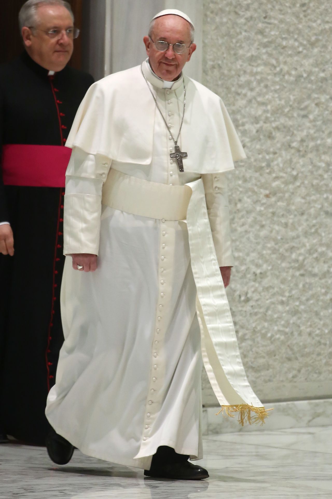 Here, Pope Francis wears a cassock. The cassock, also called a soutane, can be worn by all clerics, Beck said, but the papal one is white. According to Beck, legend has it that Pope Pius V was used to wearing a white religious habit and he wanted to keep the tradition going. "And so ever since," Beck said, "it has remained white."