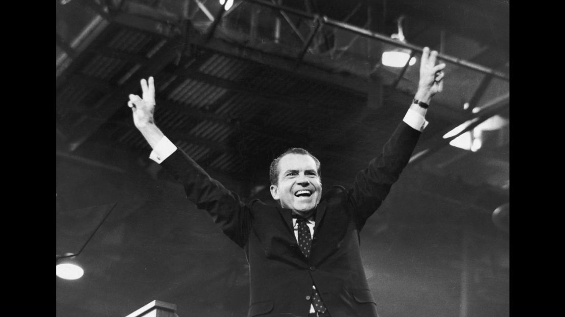 Richard Nixon gives the victory sign after receiving the presidential nomination at the Republican National Convention, in Miami, Florida, August 1968.