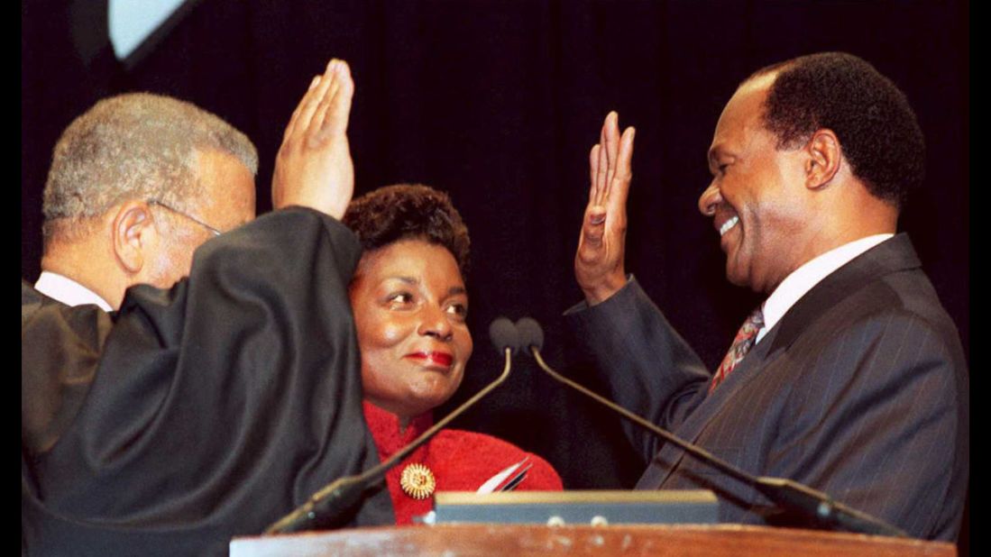 Marion Barry is sworn in as the mayor of Washington with his wife, Cora Masters Barry, at his side, in 1995. Four years earlier, he was forced from the mayor's office, and later imprisoned, for being caught on videotape smoking crack.