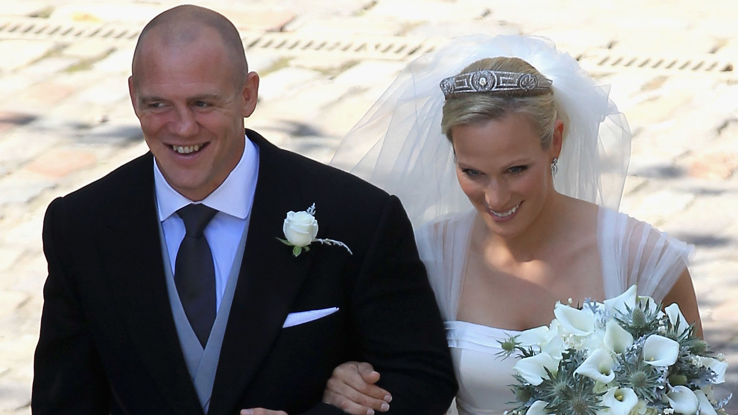 Zara Philips and Mike Tindall leave Canongate Kirk after getting married on July 30, 2011, in Edinburgh, Scotland.