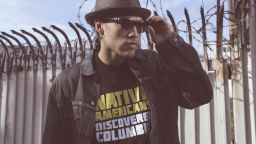 Fashion blog Beyond Buckskin released a lookbook in March 2013 intended to "highlight the professionalism of Native American artists and designers" and encourage investment in "Native-made fashion and art as forms of economic development in Indian Country." In this image from the lookbook, model Martin Sensmeier wears a "Native Americans Discovered Columbus Tee" by Navajo Jared Yazzie for OxDx, Blueberry Copper Earrings by Nicholas Galanin (Tlingit/Aleut), and beaded sunglasses by Candace Halcro (Cree/Metis).