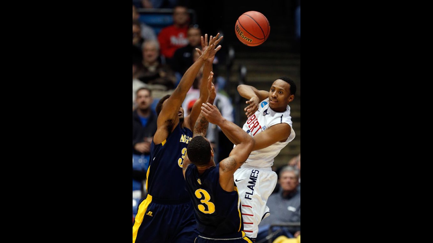 Davon Marshall of Liberty passes the ball during the first half against N.C. A&T on March 19.