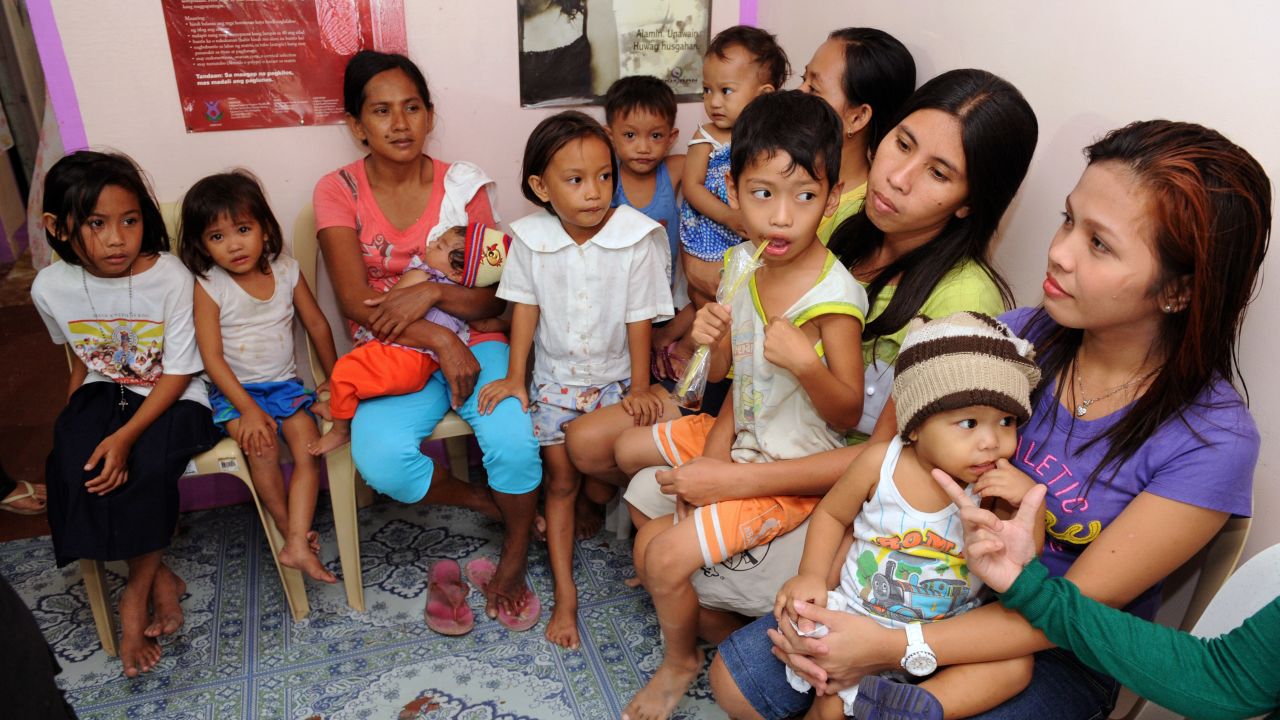 Mothers wait for family planning services at the Likhaan Center for Women's Health in Baseco, a slum in Manila, on January 16.
