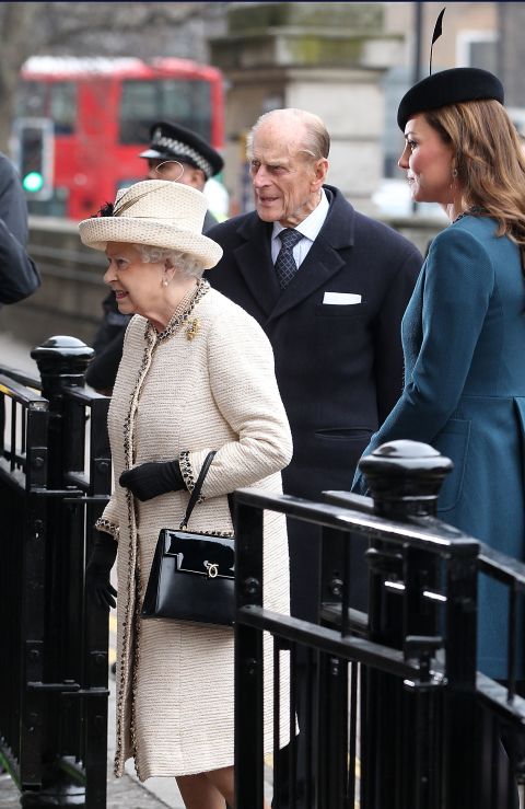 Queen Elizabeth ll, Prince Philip, Duke of Edinburgh, and Catherine, Duchess of Cambridge make an official visit to Baker Street Underground Station on March 20 in London, England.