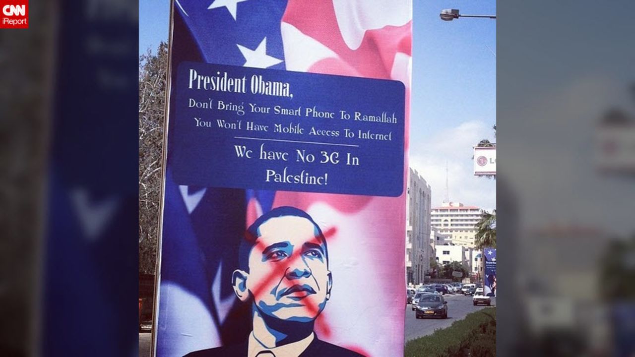 In Ramallah, West Bank, a message to Obama airs grievances regarding limits on cell phone service in the region.