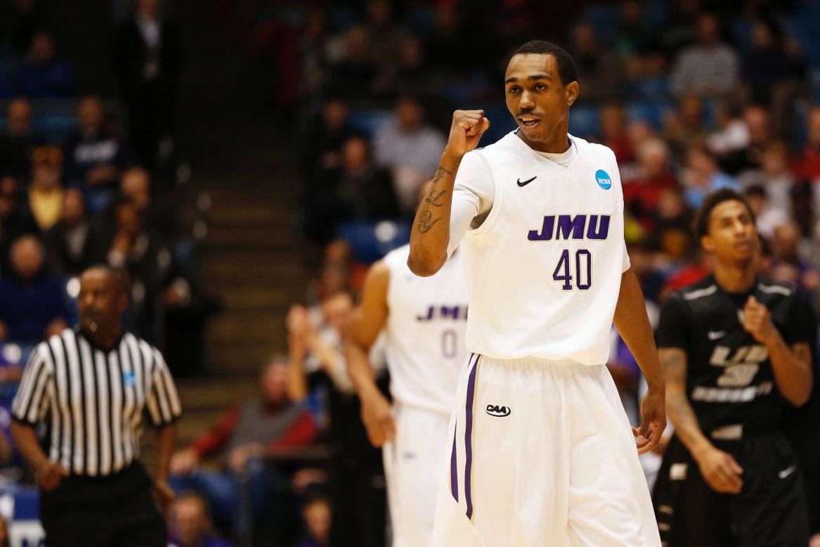 Devon Moore of James Madison celebrates in the first half against LIU Brooklyn on March 20.