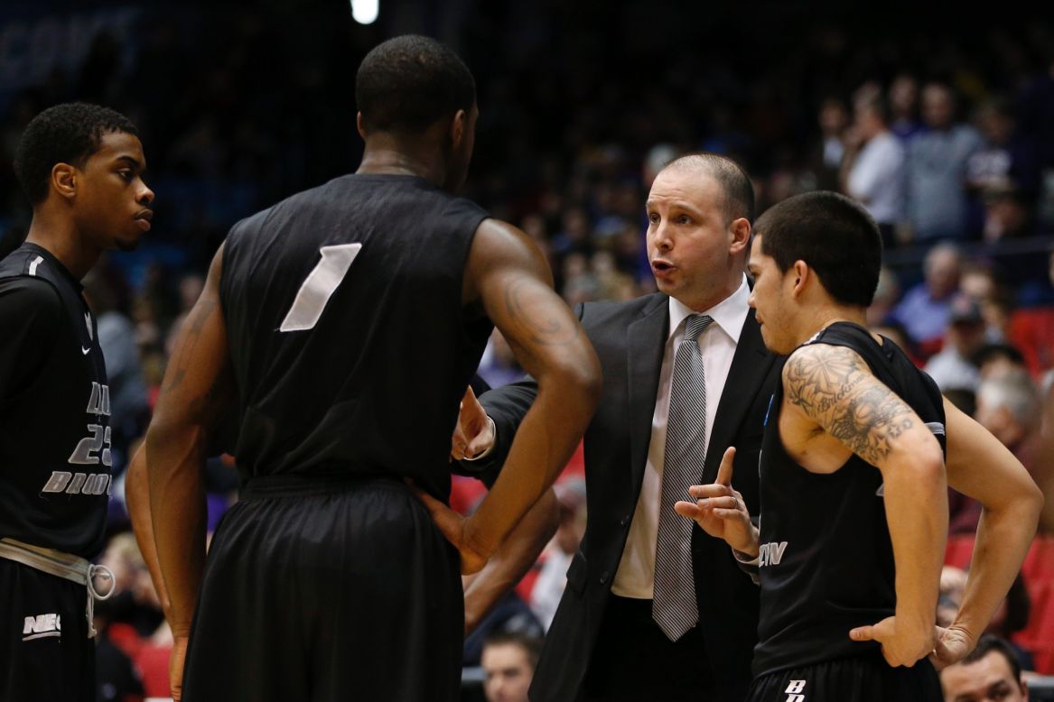 Head coach Jack Perri talks to LIU Brooklyn players during the First Four round game against James Madison on March 20.