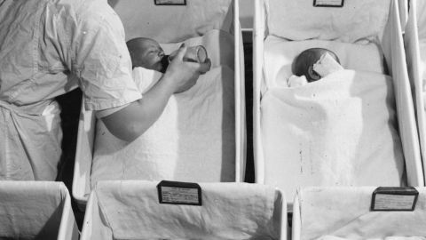 A file image of newborn babies in a hospital maternity ward, 1955.