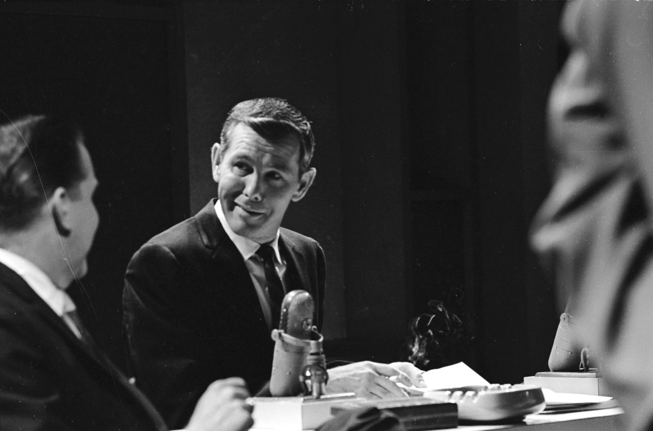 Johnny Carson's 30 years as a host of "The Tonight Show" made him a talk show icon. Carson, who hosted from 1962 to 1992, set the standard for late night show formats and style. Here, Carson speaks to a guest in 1964. 
