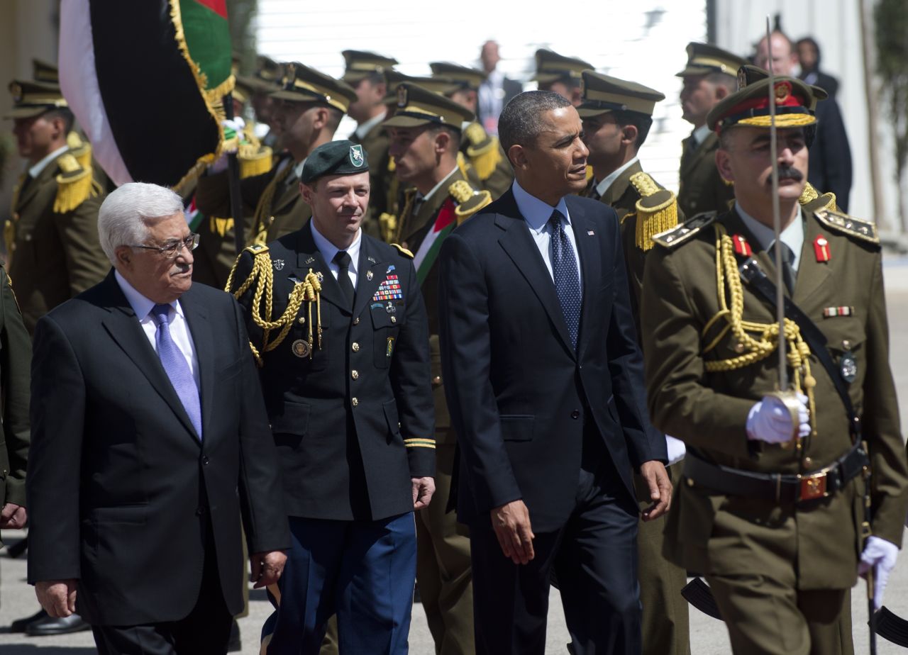 Obama and Palestinian Authority President Mahmud Abbas review the honor guard during an official arrival ceremony at the Muqata, the Palestinian Authority headquarters in the West Bank city of Ramallah, on Thursday, March 21. Obama arrived in Ramallah on his first visit as president. It's part of his sweep across the Middle East, which also includes visits to Israel and Jordan.