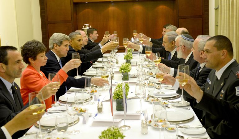 Israeli Prime Minister Benjamin Netanyahu, center right, hosts Obama at a dinner on Wednesday, March 21, Jerusalem, Israel.  Obama is making his first trip to Israel as president. 