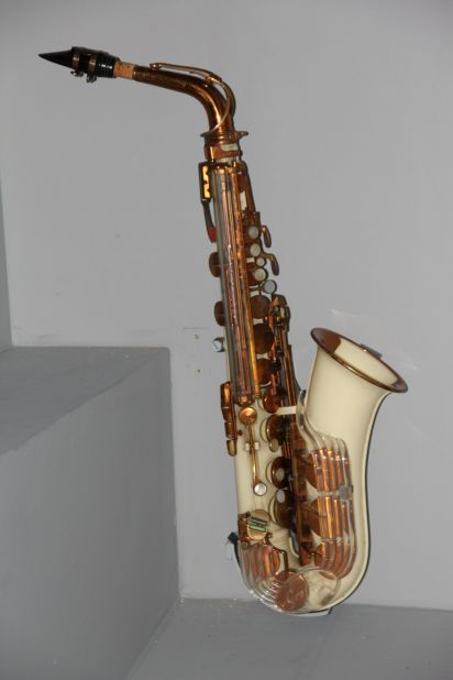 In his early teens Bowie became keen on the jazz of John Coltrane. For Christmas 1961 his father bought him this white acrylic Grafton alto sax. It used new plastics technology, and cost £55, about half the cost of a brass instrument. 