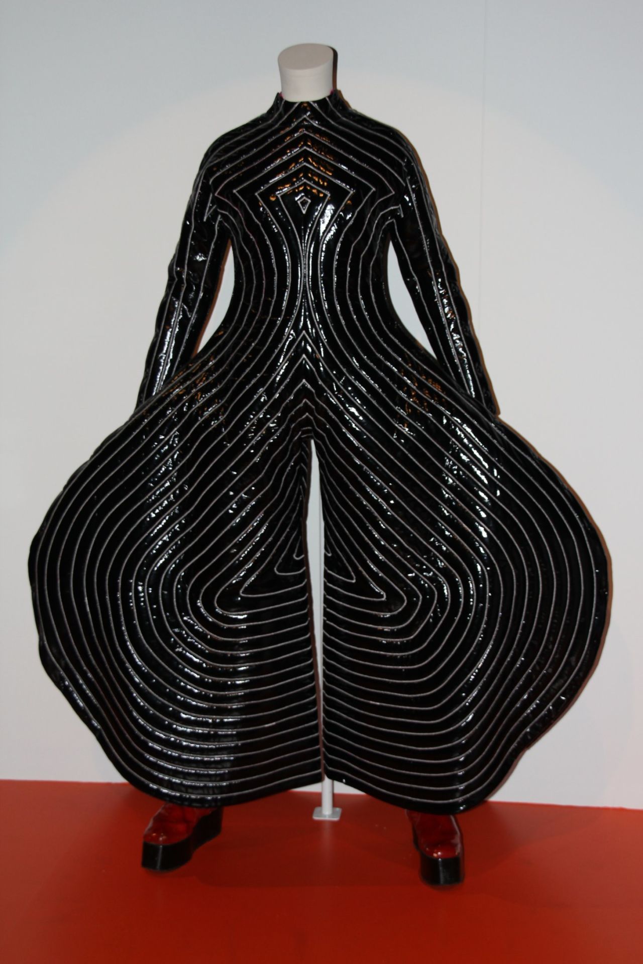 This costume was made for Bowie on the 1973 "Aladdin Sane" tour by Japanese designer Kansai Yamamoto. Bowie said the designs were "everything I wanted ... outrageous, provocative and unbelievably hot to wear under the lights."