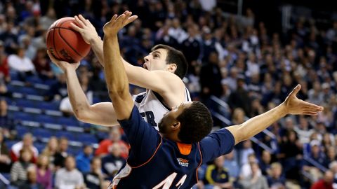 Alex Barlow of the Butler Bulldogs shoots against Cameron Ayers of the Bucknell Bison on March 21 in Lexington, Kentucky.