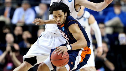 Bucknell's Bryson Johnson drives against Andrew Smith of Butler on March 21.