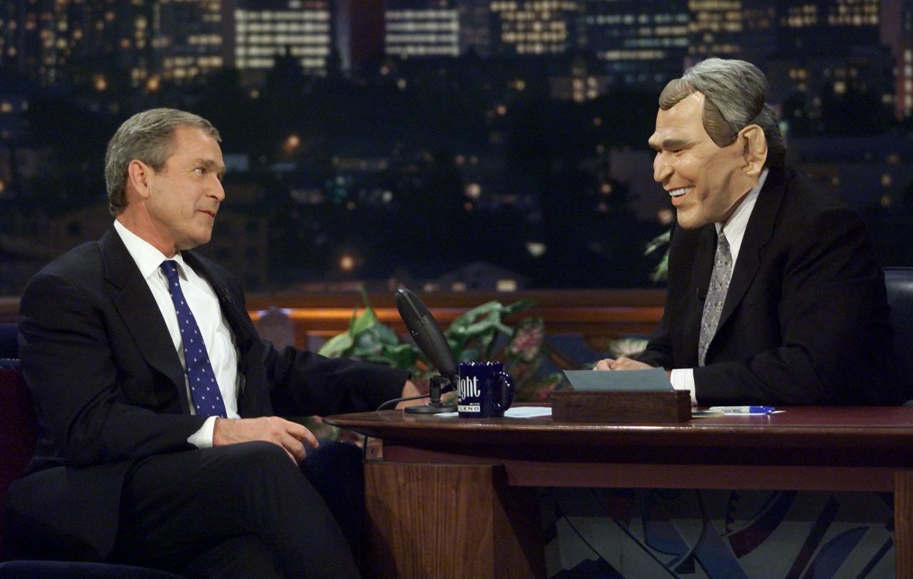Texas Gov. George W. Bush and Leno in a Bush mask on October 30, 2000.