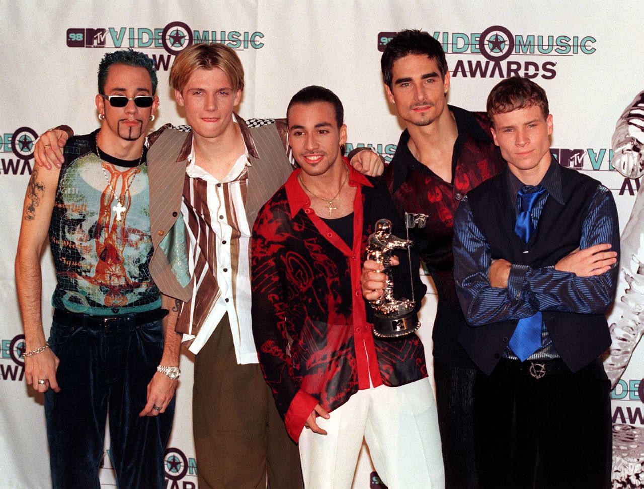 The Backstreet Boys -- <a href="http://marquee.blogs.cnn.com/2010/11/22/backstreet-boys-and-nkotb-recording-a-single-together/?iref=allsearch" target="_blank">who are back, by the way</a> -- won the devotion of scores of fans with sweet songs like "Quit Playing Games (With My Heart)" and "As Long As You Love Me." From left: A.J. McLean, Nick Carter, Howie Dorough, Kevin Richardson and Brian Littrell at the MTV Video Music Awards in 1998.