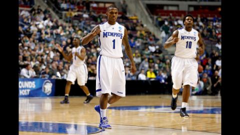 Joe Jackson of Memphis, No. 1, reacts with his teammates during the game against St. Mary's on March 21.