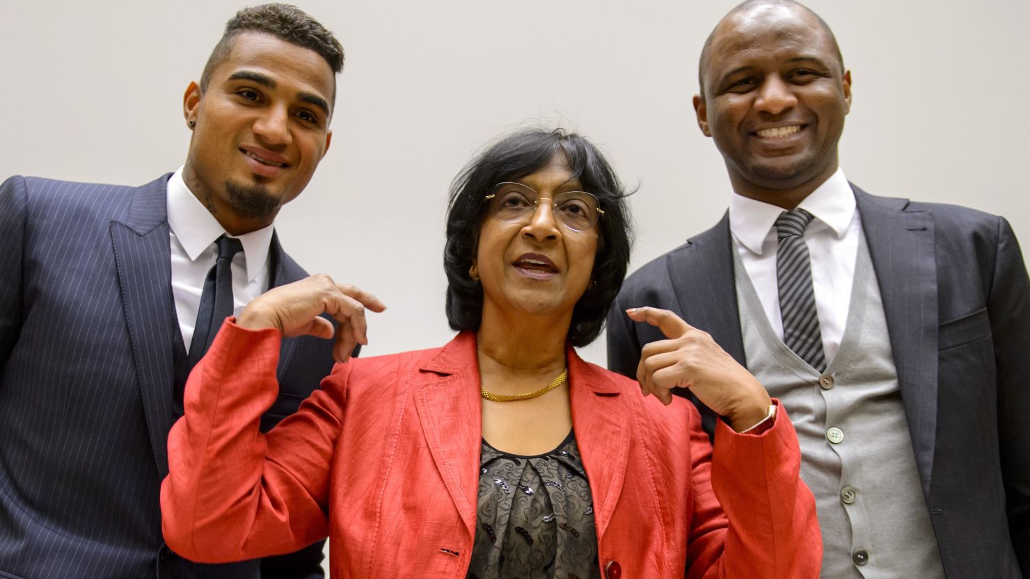 Kevin-Prince Boateng (L) and Patrick Vieira (R) with United Nations High Commissioner for Human Rights Navi Pillay