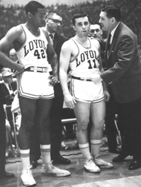 Loyola coach George Ireland (right) had four black players in his starting lineup during an era when college basketball was still predominantly white. 