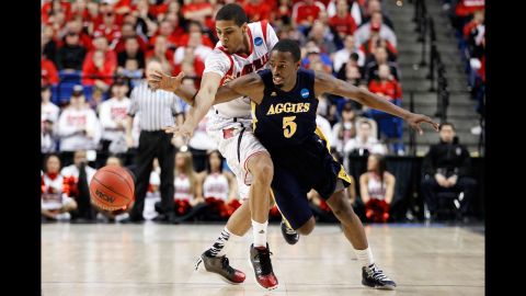 Wayne Blackshear of Louisville steals the ball from Jean Louisme of the N.C. A&T on March 21.