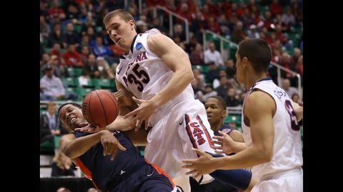 Kaleb Tarczewski of Arizona goes for the ball against Blake Jenkins of Belmont on March 21.