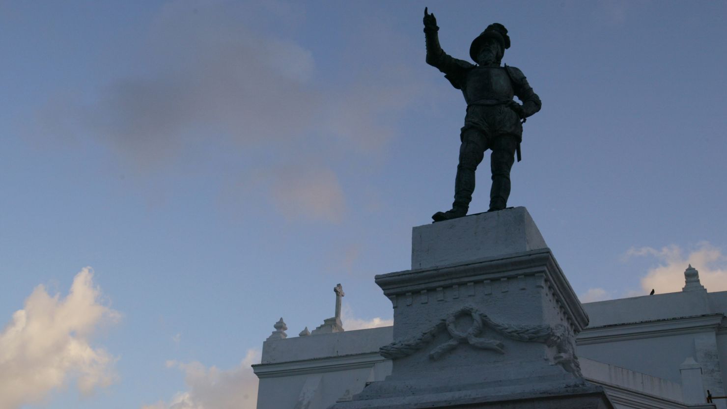  A statue of Juan Ponce de Leon sits in front of the second oldest church in the world in Old San Juan, Puerto Rico.