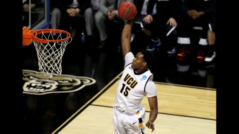 Juvonte Reddic of VCU dunks in the first half against Akron on March 21.