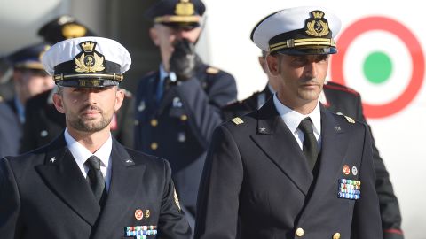 Italian marines Massimiliano Latorre (R) and Salvatore Girone (L) arrive at Ciampino airport near Rome on December 22.