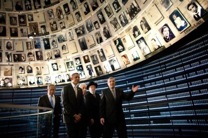President Barack Obama visits the Hall of Names at the <a href="index.php?page=&url=http%3A%2F%2Fwww.yadvashem.org%2F" target="_blank" target="_blank">Yad Vashem Holocaust memorial</a> with Israeli Prime Minister Benjamin Netanyahu, left, Israeli President Shimon Peres, center, Rabbi Yisrael Meir Lau and Avner Shalev, the museum's director, on Friday, March 22, in Jerusalem.  As part of his Mideast tour, Obama wrapped up his first trip to Israel as president and arrived in Jordan, another key ally, on Friday.